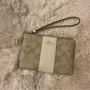 Coach Corner Zip Wristlet In Signature Canvas